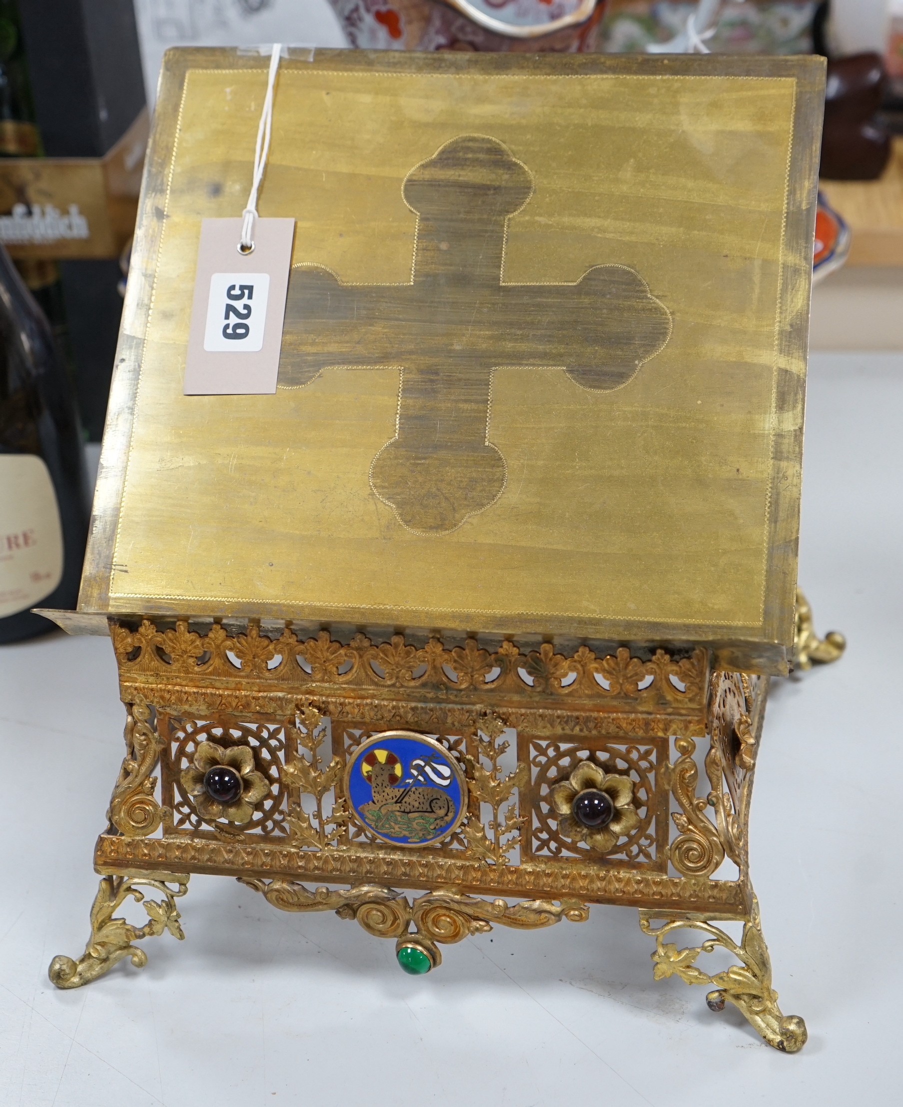 A gilt brass bible stand